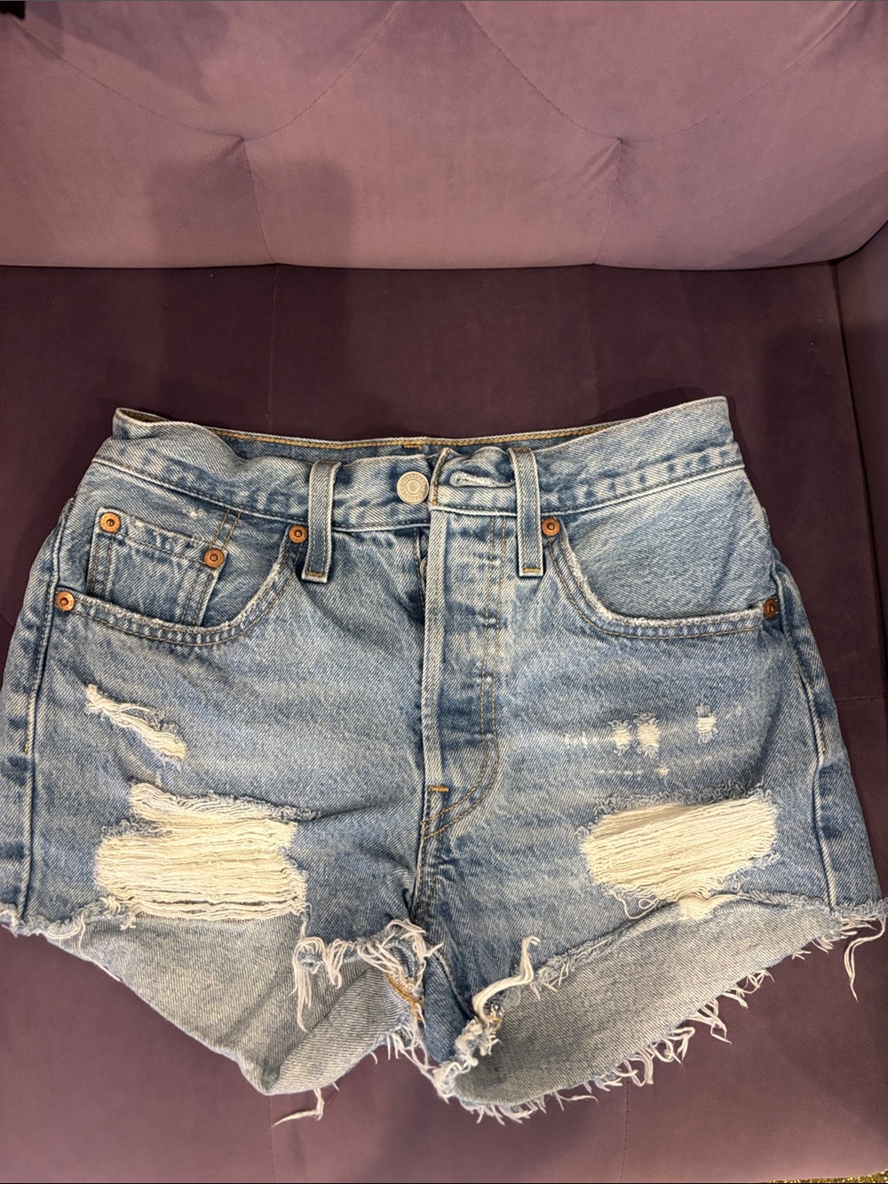 Levi's 501 light blue distressed denim cutoff shorts